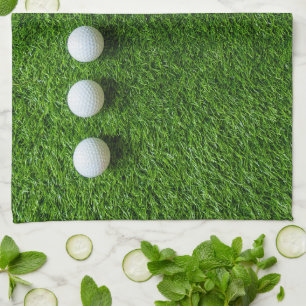 Paño De Cocina Las pelotas de golf están en hierba verde