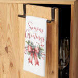 Paño De Cocina Modern Seasons Greetings Script Red Bow<br><div class="desc">Decorate for the Christmas holiday season with this festive kitchen towel featuring a modern, chic calligraphy script typography for the greeting SEASONS GREETINGS accented with a watercolor red bow and holly. ASSISTANCE: For help with design modification or personalization, resizing, transferring the design to another product or if you would like...</div>