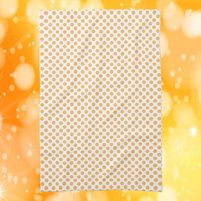 Paño De Cocina Patrón de fruta naranja (A kitchen towel with a pattern of oranges.)