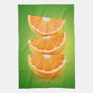 Paño De Cocina Piezas de naranja sobre verde