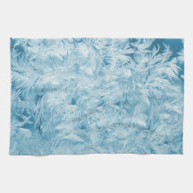 plumas azules abstractas y copos de nieve