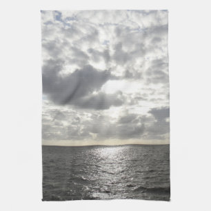 Paño De Cocina Sol brillando a través de las nubes