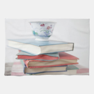 Paño De Cocina Taza de té en pila de libro