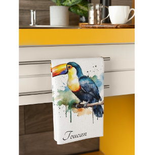 Paño De Cocina tocan colorido sentado en una rama