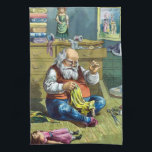 Paño De Cocina Vintage Christmas, Santa Claus haciendo muñecas de<br><div class="desc">Diseño de las vacaciones de ilustracion Vintage Feliz Navidad con una página del libro Santa Claus y Sus Obras. Publicado por McLoughlin Brothers en 1889. La historia nos cuenta del trabajo de Santa haciendo juguetes para todos los niños y chicas buenos del mundo. Esta imagen de la era victoriana muestra...</div>