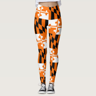Pantalones anaranjados de la yoga de las polainas