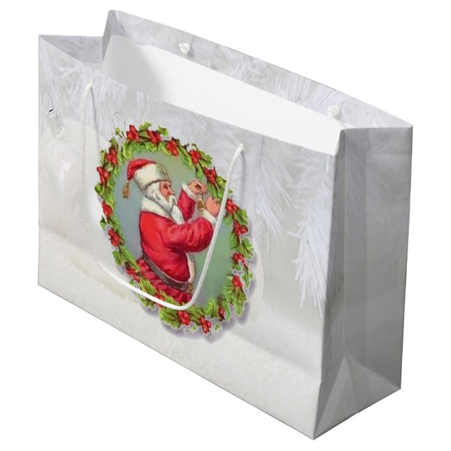 Papá Noel en una bolsa de regalo grande de Wreath (Angulo Anverso)