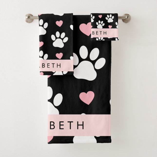 Papas de perro, garras blancas, corazones rosados, (In situ)