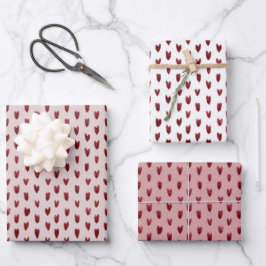Papel de ajuste de trío de corazones pintados
