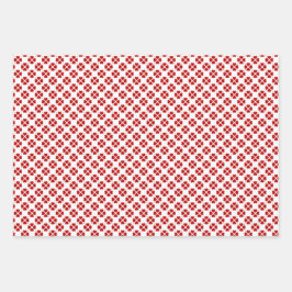 Papel de envolver rojo, dorado y plata.