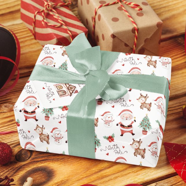 Papel de envolvimiento del polo norte de Santa (Celebrate the holidays with this cute North Pole Santa wrapping paper! )