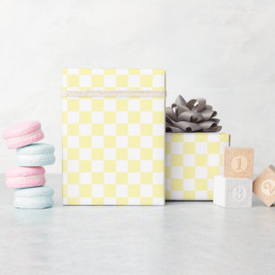 Papel de regalo a cuadros blanco y amarillo en rol