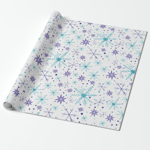 Papel de regalo azul y morado de copo de nieve
