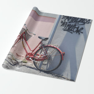 PAPEL DE REGALO BICICLETA DE COMBUSTIBLE ROJO EN CARRETERA