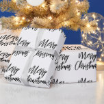 Papel De Regalo Black on White Merry Christmas Caligraphy Script<br><div class="desc">Este elegante y moderno documento de envoltura incluye las palabras "Feliz Navidad" en un guión de caligrafía de cepillos negros sobre un fondo blanco.</div>