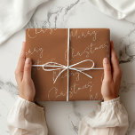 Papel De Regalo Bohemian Brown Merry Christmas<br><div class="desc">Papel de envoltura básico de color liso. Un moderno café bohemio pastel con Feliz Navidad escrito a mano impreso en un patrón de repetición. Papel de envolvimiento de Navidad Bohemio Brown Merry.</div>