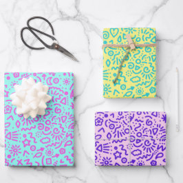 Papel de regalo colorido con garabatos caprichosos