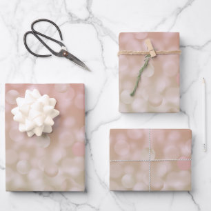 Papel de regalo con bokeh rosa y crema