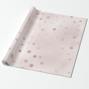 Papel de regalo con confeti rosa dorado y rubor