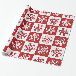 Papel de regalo con copo de nieve en cuadros rojos