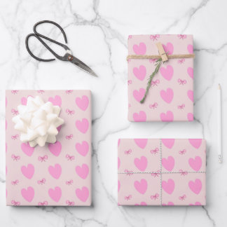 Papel de regalo con corazones y lazos rosas lindos