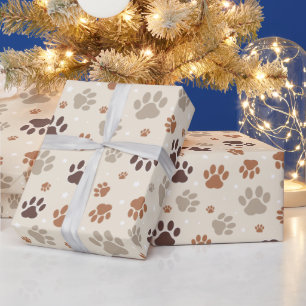 Papel de regalo con estampado de huellas de perro