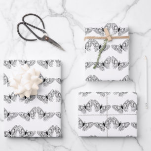 Papel de regalo con mariposas negras de encaje