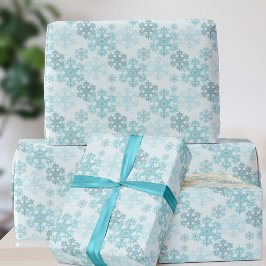 Papel de regalo con patrón de copos de nieve de hi
