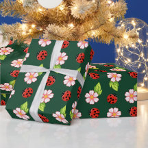 Papel de regalo con patrón de mariquita y margarit