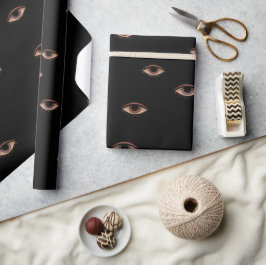 Papel de regalo con patrón de ojos oscuros