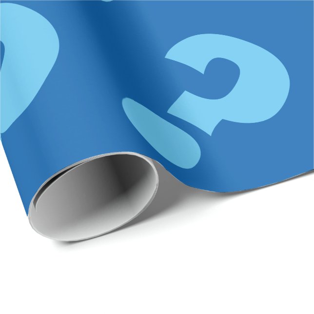 Papel de regalo con signo de interrogación azul |  (Esquina del rollo)