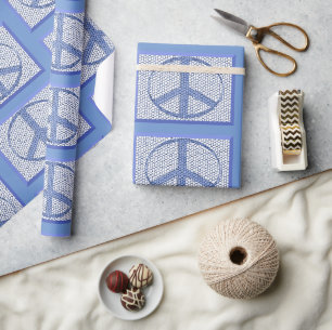 Papel de regalo con signos de paz azules