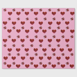 Papel de regalo corazón rojo sobre fondo rosa amor