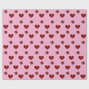 Papel de regalo corazón rojo sobre fondo rosa amor