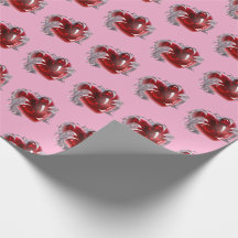 Papel de regalo corazón rojo sobre fondo rosa amor