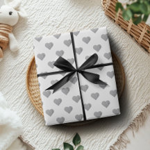 Corazones gris de hormigón simétricos pequeños en 