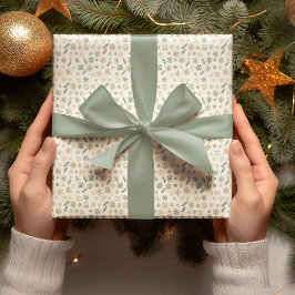 Papel de regalo de copos de nieve dorados y pino