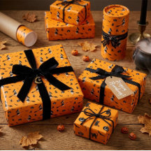 Papel de regalo de Halloween naranja con brujas