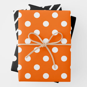 Papel de regalo de hojas naranjas, negras y blanca
