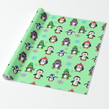 Papel de regalo de los pingüinos y de los copos de