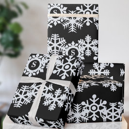 Papel de regalo de Navidad con monograma de copo d