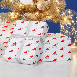 Papel de regalo de Navidad con sombrero de Santa