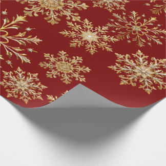 Papel de regalo de Navidad dorado y rojo con copos