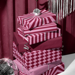 Papel de regalo de rayas rojas rosadas