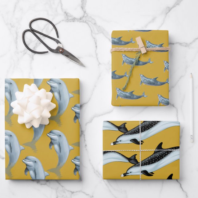 Papel de regalo dorado con patrones de delfines (Anverso)