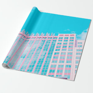 PAPEL DE REGALO EDIFICIO DE CONCRETO BLANCO Y AZUL BAJO CIELO AZUL