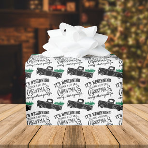 Papel De Regalo Empezando a parecer Navidades de camiones negros