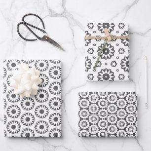 Papel de regalo en gris y blanco.