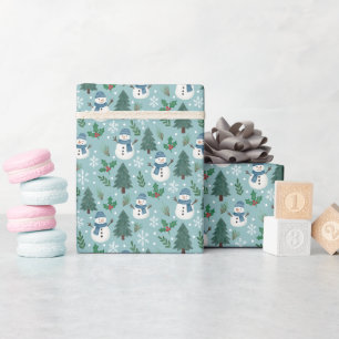 Papel de regalo enrollado con patrón de muñecos de