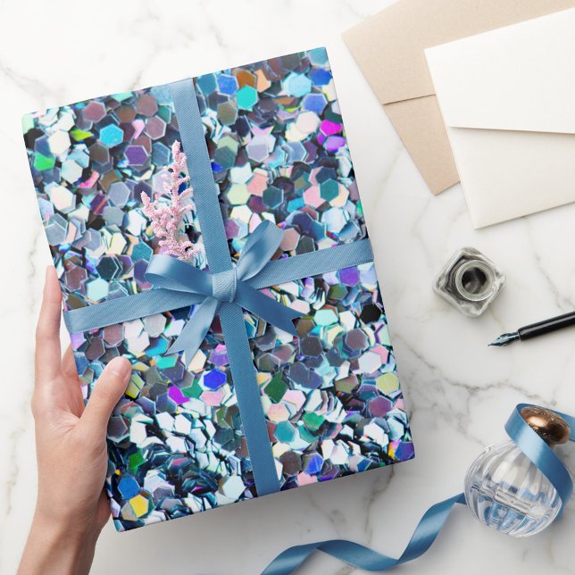 Papel De Regalo Estilo purpurina (A vibrant roll of wrapping paper covered in colorful shimmering confetti patterns. )